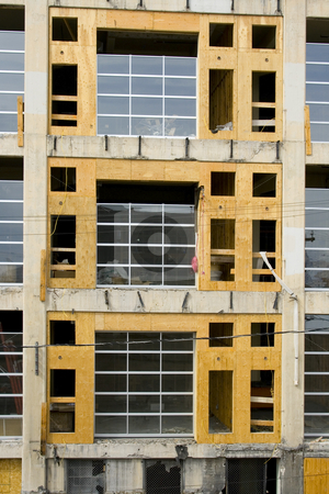 To use this stock image in your creative project, please select the size you need over to the right and click the "Add to Cart" button.
Your downloaded image will come with the Cutcaster watermark removed so don’t worry about the watermark you see on this page. Close up on a Building under Construction stock photo, Close up on a Building under Construction in downtown by Mehmet Dilsiz