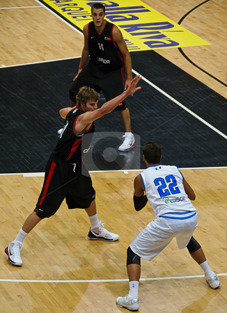 To use this stock image in your creative project, please select the size you need over to the right and click the "Add to Cart" button.
Your downloaded image will come with the Cutcaster watermark removed so don’t worry about the watermark you see on this page. FIBA Trentino Cup: Italy vs Canada stock photo, Game 2 of FIBA Trentino Cup: Italy vs Canada. The tournament was played in Trento (Italy) between the 25th and the 27th of July 2009. Marco Belinelli against the Canadian defense. Photo taken on the 25th of July, 2009. by Alessandro Rizzolli