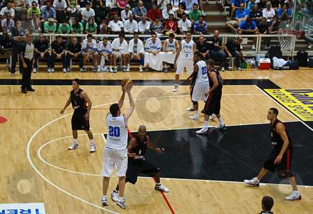 To use this stock image in your creative project, please select the size you need over to the right and click the "Add to Cart" button.
Your downloaded image will come with the Cutcaster watermark removed so don’t worry about the watermark you see on this page. FIBA Trentino Cup: Italy vs Canada stock photo, Game 2 of FIBA Trentino Cup: Italy vs Canada. The tournament was played in Trento (Italy) between the 25th and the 27th of July 2009. Italian player Valerio Amoroso shoots for a 3 points basket. Photo taken on the 25th of July, 2009. by Alessandro Rizzolli