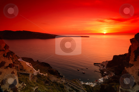 To use this stock image in your creative project, please select the size you need over to the right and click the "Add to Cart" button.
Your downloaded image will come with the Cutcaster watermark removed so don’t worry about the watermark you see on this page. Sunset in Santorini stock photo, Image shows a spectacular sunset in the village of Oia, Santorini, Greece by Andreas Karelias