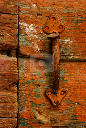To use this stock image in your creative project, please select the size you need over to the right and click the "Add to Cart" button.
Your downloaded image will come with the Cutcaster watermark removed so don’t worry about the watermark you see on this page. Door handle stock photo, Image shows a rusty handle on a highly textured country door by Andreas Karelias