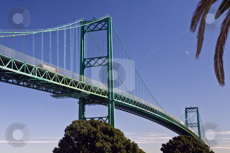 To use this stock image in your creative project, please select the size you need over to the right and click the "Add to Cart" button.
Your downloaded image will come with the Cutcaster watermark removed so don’t worry about the watermark you see on this page. Vincent Thomas Bridge, Los Angeles Harbor stock photo, Vincent Thomas Bridge soars over the main channel between the San Pedro district of Los Angeles and Terminal Island by Bart Everett