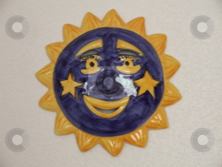 To use this stock image in your creative project, please select the size you need over to the right and click the "Add to Cart" button.
Your downloaded image will come with the Cutcaster watermark removed so don’t worry about the watermark you see on this page. Decorative Sun Face stock photo, Decorative Sun Face by Stephen Lambourne
