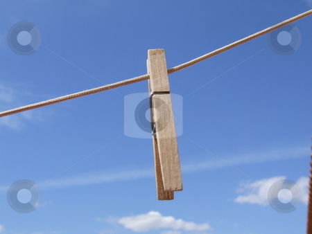 To use this stock image in your creative project, please select the size you need over to the right and click the "Add to Cart" button.
Your downloaded image will come with the Cutcaster watermark removed so don’t worry about the watermark you see on this page. Single Cloths Peg with Blue Sky Background stock photo, Single Cloths Peg with Blue Sky Background by Stephen Lambourne