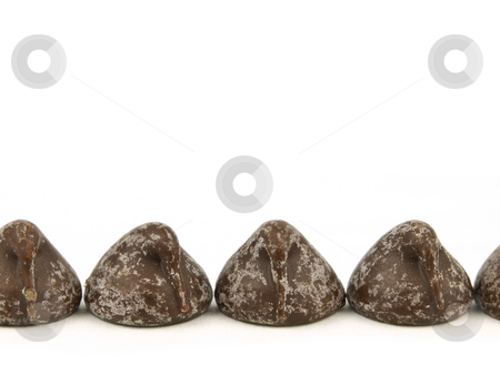To use this stock image in your creative project, please select the size you need over to the right and click the "Add to Cart" button.
Your downloaded image will come with the Cutcaster watermark removed so don’t worry about the watermark you see on this page. Chocolate chips on white background stock photo, Chocolate chips on a white background with copyspace by John Teeter