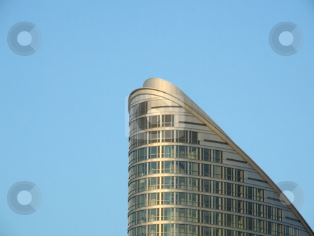 To use this stock image in your creative project, please select the size you need over to the right and click the "Add to Cart" button.
Your downloaded image will come with the Cutcaster watermark removed so don’t worry about the watermark you see on this page. Skyscraper Abstract with Blue Sky stock photo, Skyscraper Abstract with Blue Sky by Stephen Lambourne