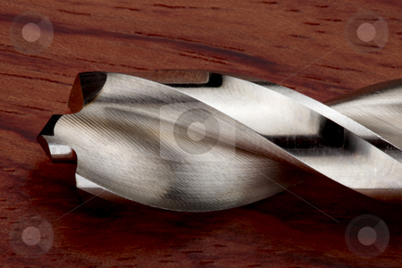 To use this stock image in your creative project, please select the size you need over to the right and click the "Add to Cart" button.
Your downloaded image will come with the Cutcaster watermark removed so don’t worry about the watermark you see on this page. Drill bit on wood stock photo, Close up of drill bit on stained wood by James Barber