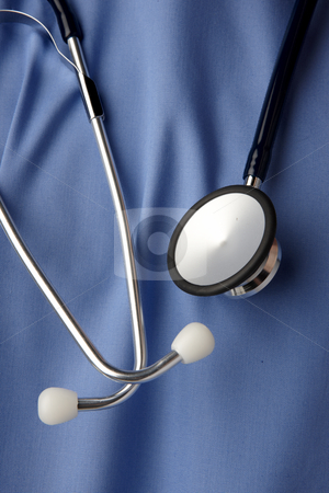 To use this stock image in your creative project, please select the size you need over to the right and click the "Add to Cart" button.
Your downloaded image will come with the Cutcaster watermark removed so don’t worry about the watermark you see on this page. Blue hospital scrubs stock photo, Close up of blue hospital scrubs with stethoscope by James Barber