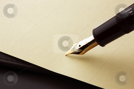 To use this stock image in your creative project, please select the size you need over to the right and click the "Add to Cart" button.
Your downloaded image will come with the Cutcaster watermark removed so don’t worry about the watermark you see on this page. Fountain pen on parchment paper stock photo, Fountain pen about to write on parchment paper by James Barber