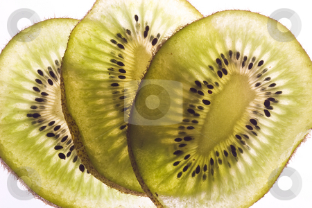 To use this stock image in your creative project, please select the size you need over to the right and click the "Add to Cart" button.
Your downloaded image will come with the Cutcaster watermark removed so don’t worry about the watermark you see on this page. Kiwi slices stock photo, by Marianne Dent