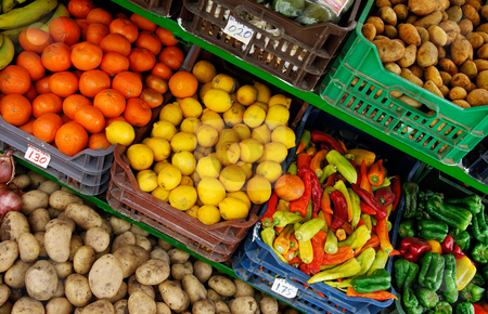 To use this stock image in your creative project, please select the size you need over to the right and click the "Add to Cart" button.
Your downloaded image will come with the Cutcaster watermark removed so don’t worry about the watermark you see on this page. Fruit and vegetable stand stock photo, Image shows a fruit and vegetable market stand by Andreas Karelias