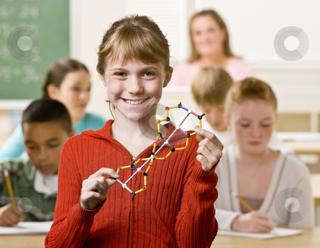 To use this stock image in your creative project, please select the size you need over to the right and click the "Add to Cart" button.
Your downloaded image will come with the Cutcaster watermark removed so don’t worry about the watermark you see on this page. Student holding helix in classroom stock photo, Student holding helix in classroom by Jonathan Ross