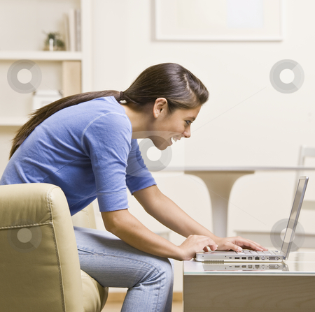 To use this stock image in your creative project, please select the size you need over to the right and click the "Add to Cart" button.
Your downloaded image will come with the Cutcaster watermark removed so don’t worry about the watermark you see on this page. Teenage girl using laptop stock photo, Teenage girl using laptop by Jonathan Ross
