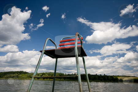 To use this stock image in your creative project, please select the size you need over to the right and click the "Add to Cart" button.
Your downloaded image will come with the Cutcaster watermark removed so don’t worry about the watermark you see on this page. Red chair stock photo, Chair in a lake by Istv??n Cs??k