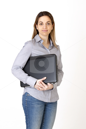 To use this stock image in your creative project, please select the size you need over to the right and click the "Add to Cart" button.
Your downloaded image will come with the Cutcaster watermark removed so don’t worry about the watermark you see on this page. Young women with laptop stock photo, Young girl, writes in her computer by Marios Karampalis