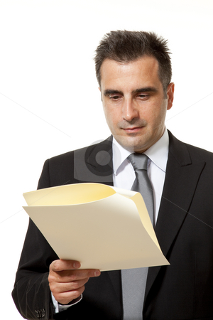 To use this stock image in your creative project, please select the size you need over to the right and click the "Add to Cart" button.
Your downloaded image will come with the Cutcaster watermark removed so don’t worry about the watermark you see on this page. Businessman with document stock photo, Businessman reads a document with query by Marios Karampalis