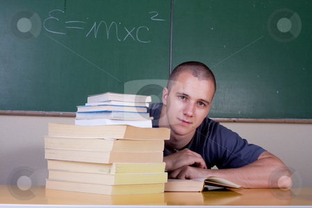 To use this stock image in your creative project, please select the size you need over to the right and click the "Add to Cart" button.
Your downloaded image will come with the Cutcaster watermark removed so don’t worry about the watermark you see on this page. young student reading stock photo, Young student reading by Istv??n Cs??k