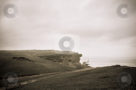 To use this stock image in your creative project, please select the size you need over to the right and click the "Add to Cart" button.
Your downloaded image will come with the Cutcaster watermark removed so don’t worry about the watermark you see on this page. Cliff stock photo, A cliff by the water by Fredrik Elfdahl