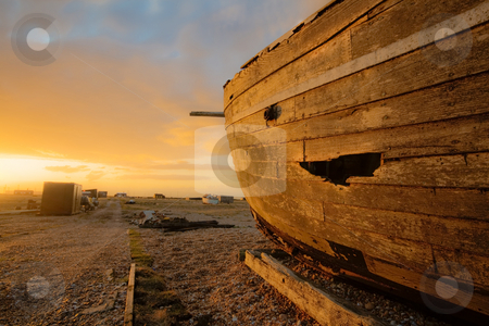 To use this stock image in your creative project, please select the size you need over to the right and click the "Add to Cart" button.
Your downloaded image will come with the Cutcaster watermark removed so don’t worry about the watermark you see on this page. Ship on land stock photo, Old ship laying on land by Fredrik Elfdahl