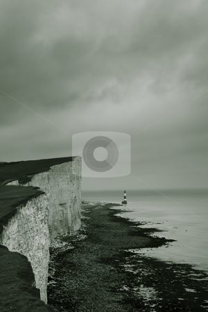 To use this stock image in your creative project, please select the size you need over to the right and click the "Add to Cart" button.
Your downloaded image will come with the Cutcaster watermark removed so don’t worry about the watermark you see on this page. Cliff stock photo, A cliff by the water by Fredrik Elfdahl