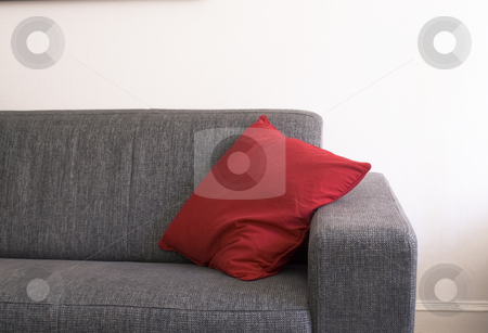 To use this stock image in your creative project, please select the size you need over to the right and click the "Add to Cart" button.
Your downloaded image will come with the Cutcaster watermark removed so don’t worry about the watermark you see on this page. Couch stock photo, Couch with red pillow by Fredrik Elfdahl