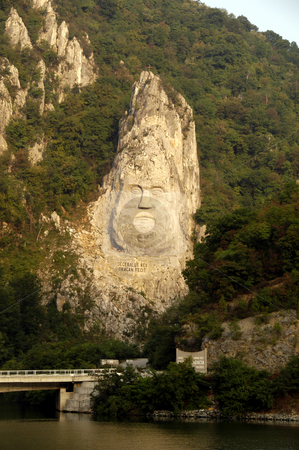 To use this stock image in your creative project, please select the size you need over to the right and click the "Add to Cart" button.
Your downloaded image will come with the Cutcaster watermark removed so don’t worry about the watermark you see on this page. King Decebalus stock photo, Romania, Iron Gate gorge, Danube River, Monument to King Decebalus by David Ryan