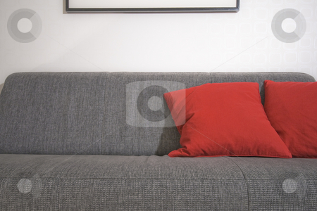 To use this stock image in your creative project, please select the size you need over to the right and click the "Add to Cart" button.
Your downloaded image will come with the Cutcaster watermark removed so don’t worry about the watermark you see on this page. Couch and red pillow stock photo, A couch and red pillow by Fredrik Elfdahl