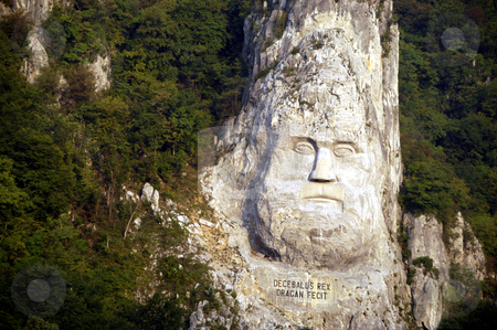 To use this stock image in your creative project, please select the size you need over to the right and click the "Add to Cart" button.
Your downloaded image will come with the Cutcaster watermark removed so don’t worry about the watermark you see on this page. King Decebalus stock photo, Romania, Iron Gate gorge, Danube River, Monument to King Decebalus by David Ryan