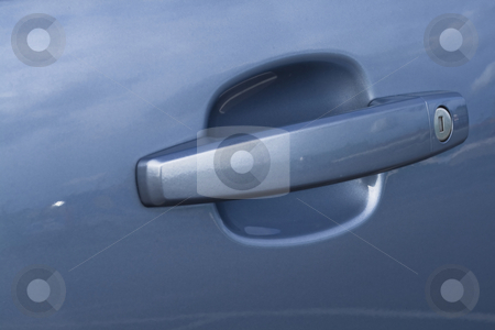 To use this stock image in your creative project, please select the size you need over to the right and click the "Add to Cart" button.
Your downloaded image will come with the Cutcaster watermark removed so don’t worry about the watermark you see on this page. Car handle with a lock in a close up stock photo, Car handle with a lock in a close up by Fredrik Elfdahl
