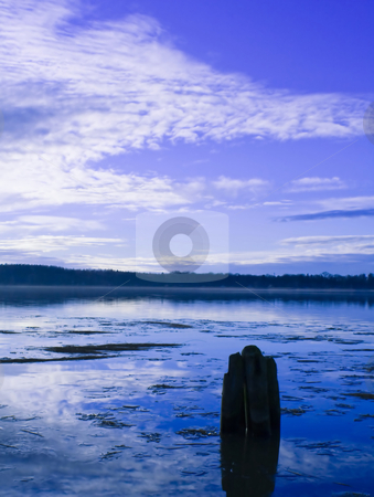 To use this stock image in your creative project, please select the size you need over to the right and click the "Add to Cart" button.
Your downloaded image will come with the Cutcaster watermark removed so don’t worry about the watermark you see on this page. Water and Ice stock photo, Water with a pole and blue sky by Fredrik Elfdahl