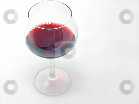 To use this stock image in your creative project, please select the size you need over to the right and click the "Add to Cart" button.
Your downloaded image will come with the Cutcaster watermark removed so don’t worry about the watermark you see on this page. A Single Glass of Red Wine Isolated On White stock photo, This photo is a single glass of red wine isolated on a black background. by Valerie Garner