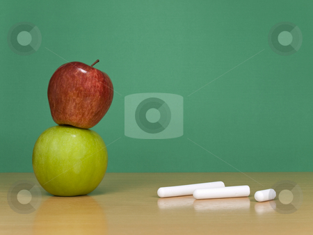 To use this stock image in your creative project, please select the size you need over to the right and click the "Add to Cart" button.
Your downloaded image will come with the Cutcaster watermark removed so don’t worry about the watermark you see on this page. At the classroom stock photo, Some chalks and a red apple over a green one. A green chalkboard on the background. by Ignacio Gonzalez Prado