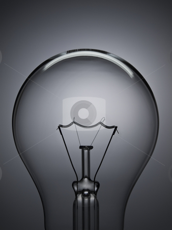 To use this stock image in your creative project, please select the size you need over to the right and click the "Add to Cart" button.
Your downloaded image will come with the Cutcaster watermark removed so don’t worry about the watermark you see on this page. Bulb light over grey stock photo, Close up on a transparent light bulb over a grey background. by Ignacio Gonzalez Prado