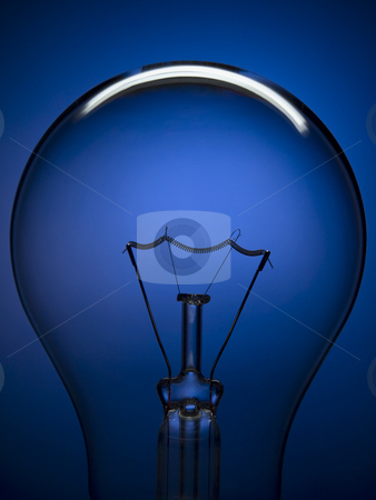 To use this stock image in your creative project, please select the size you need over to the right and click the "Add to Cart" button.
Your downloaded image will come with the Cutcaster watermark removed so don’t worry about the watermark you see on this page. Bulb light on blue stock photo, Close up on a transparent light bulb over a blue background. by Ignacio Gonzalez Prado