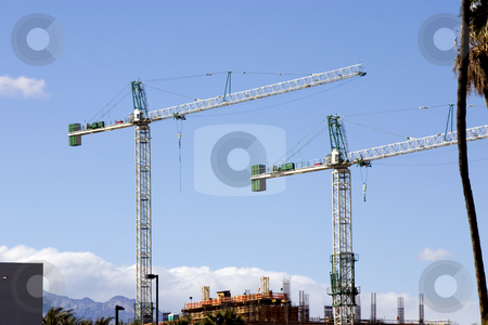 To use this stock image in your creative project, please select the size you need over to the right and click the "Add to Cart" button.
Your downloaded image will come with the Cutcaster watermark removed so don’t worry about the watermark you see on this page. Construction site with Two Cranes in the strip in Las Vegas stock photo, Construction site Cranes in the strip in Las Vegas by Mehmet Dilsiz