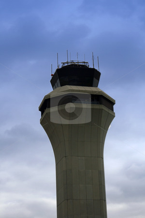To use this stock image in your creative project, please select the size you need over to the right and click the "Add to Cart" button.
Your downloaded image will come with the Cutcaster watermark removed so don’t worry about the watermark you see on this page. Air traffic control tower stock photo, Air Traffic Control Tower with Clouds on the Background by Mehmet Dilsiz
