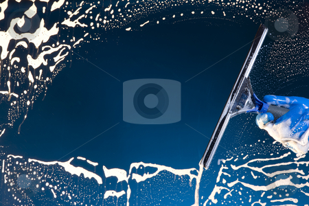 To use this stock image in your creative project, please select the size you need over to the right and click the "Add to Cart" button.
Your downloaded image will come with the Cutcaster watermark removed so don’t worry about the watermark you see on this page. Window washer cleaning glass stock photo, A soapy window with a squeegee cleanjng the glass by James Barber