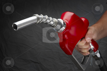 To use this stock image in your creative project, please select the size you need over to the right and click the "Add to Cart" button.
Your downloaded image will come with the Cutcaster watermark removed so don’t worry about the watermark you see on this page. Fill up stock photo, Man with gas nozzle in hand at gas station by James Barber