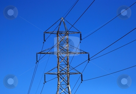 To use this stock image in your creative project, please select the size you need over to the right and click the "Add to Cart" button.
Your downloaded image will come with the Cutcaster watermark removed so don’t worry about the watermark you see on this page. Power Transmission Lines stock photo, Electrical power cables and a tower by Tim Elliott