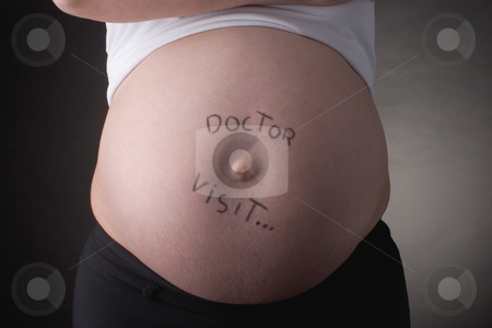To use this stock image in your creative project, please select the size you need over to the right and click the "Add to Cart" button.
Your downloaded image will come with the Cutcaster watermark removed so don’t worry about the watermark you see on this page. Doctor visit belly stock photo, Seven month old belly with doctor visit... by Yann Poirier