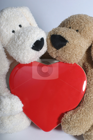 To use this stock image in your creative project, please select the size you need over to the right and click the "Add to Cart" button.
Your downloaded image will come with the Cutcaster watermark removed so don’t worry about the watermark you see on this page. Puppy hug heart stock photo, Two stuff puppy hugging a metal heart by Yann Poirier