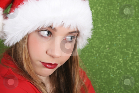 To use this stock image in your creative project, please select the size you need over to the right and click the "Add to Cart" button.
Your downloaded image will come with the Cutcaster watermark removed so don’t worry about the watermark you see on this page. Christmas Teen stock photo, Teenager with red lips wearing a christmas hat by Vanessa Van Rensburg