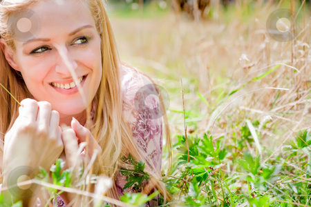 To use this stock image in your creative project, please select the size you need over to the right and click the "Add to Cart" button.
Your downloaded image will come with the Cutcaster watermark removed so don’t worry about the watermark you see on this page. Happy lifestyle girl stock photo, A blond woman in the park with sunny weather by Frenk and Danielle Kaufmann