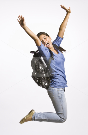 To use this stock image in your creative project, please select the size you need over to the right and click the "Add to Cart" button.
Your downloaded image will come with the Cutcaster watermark removed so don’t worry about the watermark you see on this page. Student wearing backpack jumping stock photo, Student wearing backpack jumping by Jonathan Ross