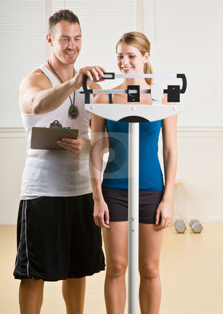 To use this stock image in your creative project, please select the size you need over to the right and click the "Add to Cart" button.
Your downloaded image will come with the Cutcaster watermark removed so don’t worry about the watermark you see on this page. Personal training weight woman in health club stock photo, Personal training weight woman in health club by Jonathan Ross