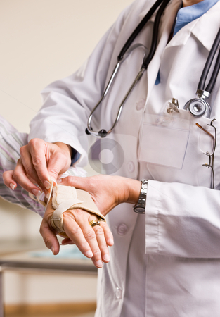 To use this stock image in your creative project, please select the size you need over to the right and click the "Add to Cart" button.
Your downloaded image will come with the Cutcaster watermark removed so don’t worry about the watermark you see on this page. Doctor adjusting woman?s wrist splint stock photo, Doctor adjusting woman?s wrist splint by Jonathan Ross