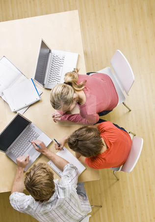 To use this stock image in your creative project, please select the size you need over to the right and click the "Add to Cart" button.
Your downloaded image will come with the Cutcaster watermark removed so don’t worry about the watermark you see on this page. Students studying together in classroom on laptops stock photo, Students studying together in classroom on laptops by Jonathan Ross