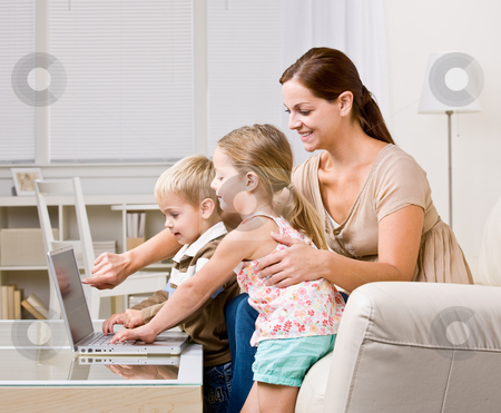 To use this stock image in your creative project, please select the size you need over to the right and click the "Add to Cart" button.
Your downloaded image will come with the Cutcaster watermark removed so don’t worry about the watermark you see on this page. Mother showing children laptop stock photo, Mother showing children laptop by Jonathan Ross