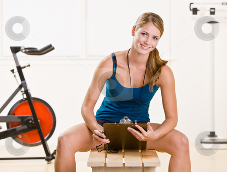 To use this stock image in your creative project, please select the size you need over to the right and click the "Add to Cart" button.
Your downloaded image will come with the Cutcaster watermark removed so don’t worry about the watermark you see on this page. Woman holding stopwatch and clipboard stock photo, Woman holding stopwatch and clipboard by Jonathan Ross