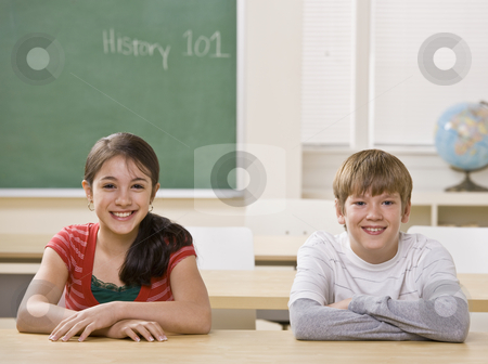 To use this stock image in your creative project, please select the size you need over to the right and click the "Add to Cart" button.
Your downloaded image will come with the Cutcaster watermark removed so don’t worry about the watermark you see on this page. Students at desk in classroom stock photo, Students at desk in classroom by Jonathan Ross